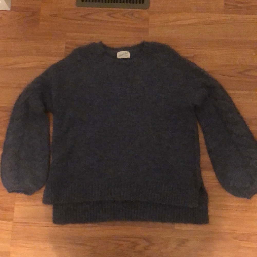 Blue sweater with bell sleeves